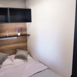 Majhna spalnica v mobilni hiški Hosekra EKO+
